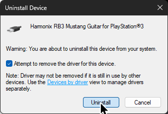 A screenshot of the device uninstall prompt. "Attempt to remove the driver for this device" is ticked and the cursor is over "Uninstall."