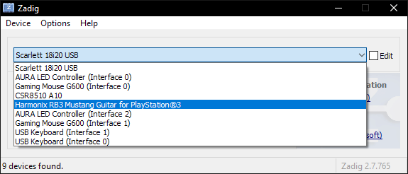 Una captura de Zadig mostrando "Harmonix RB3 Mustang Guitar for PlayStation® 3" resaltado en la lista de dispositivos.