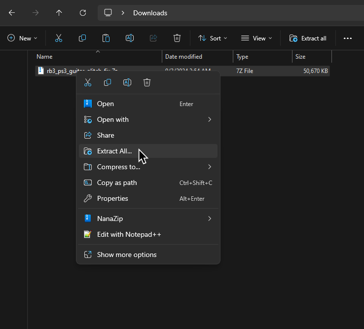 rb3_ps3_guitar_glitch_fix.7z being extracted.